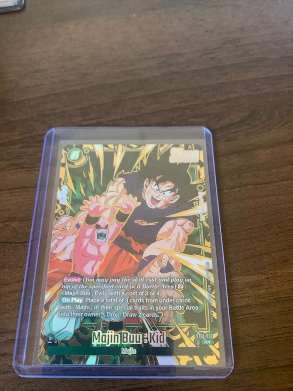 Majin Buu & Kid Goku Holographic Trading Card Sleeve — Green & Gold Artwork